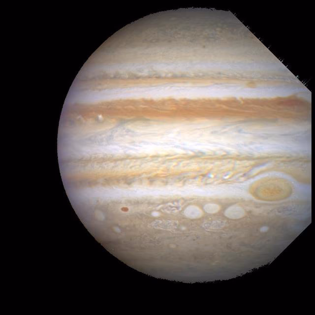 Jupiter showing the equatorial bands, polar regions, and the Great Red Spot.